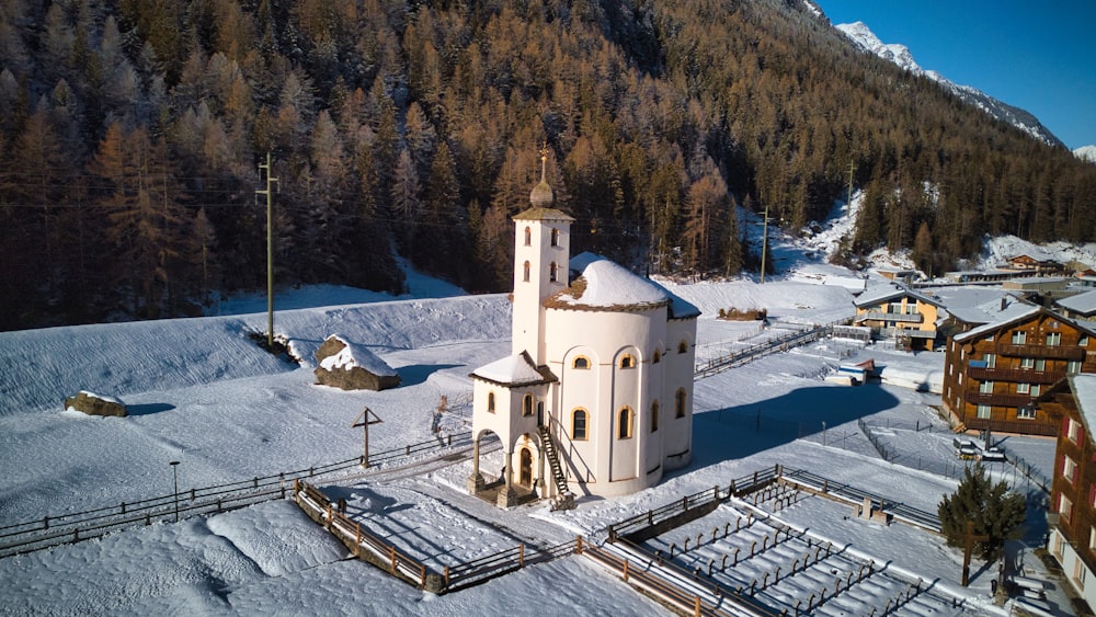 a church in the middle of a snowy mountain