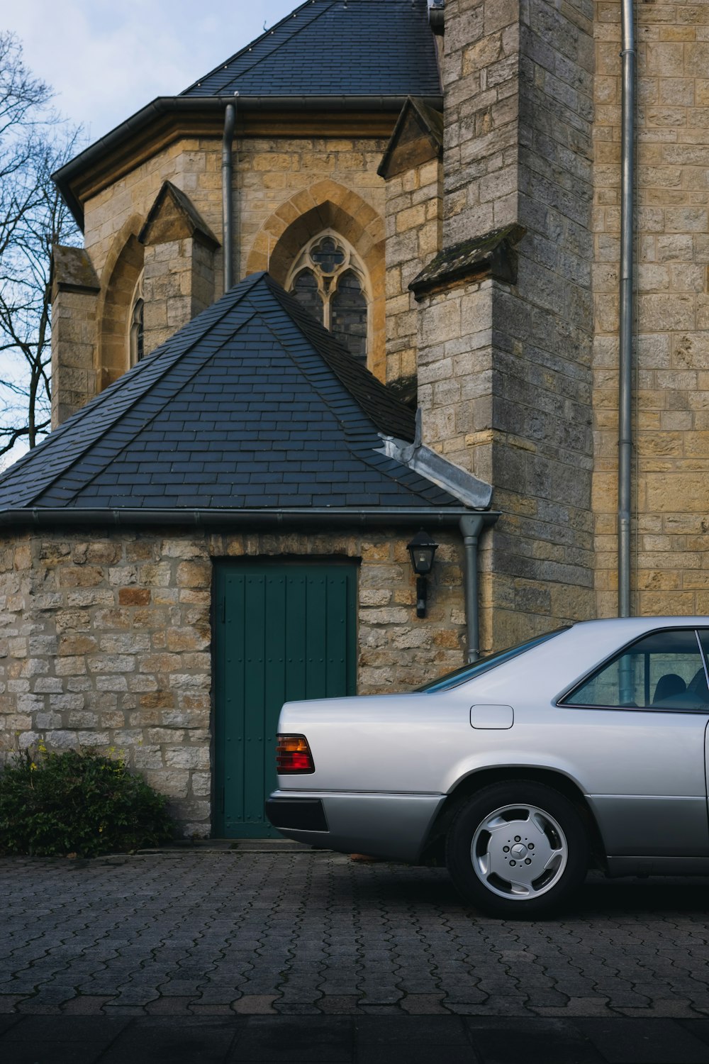 a car parked in front of a church
