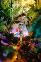 A whimsical illustration of Anija's enchanted dress glowing softly in a forest clearing.