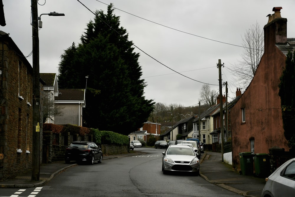 a street with cars parked on the side of it