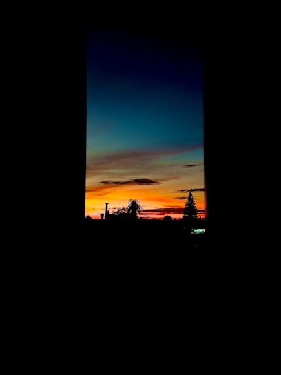 A vibrant sunset shot perfectly framed using Framemaster AI's real-time guidance.