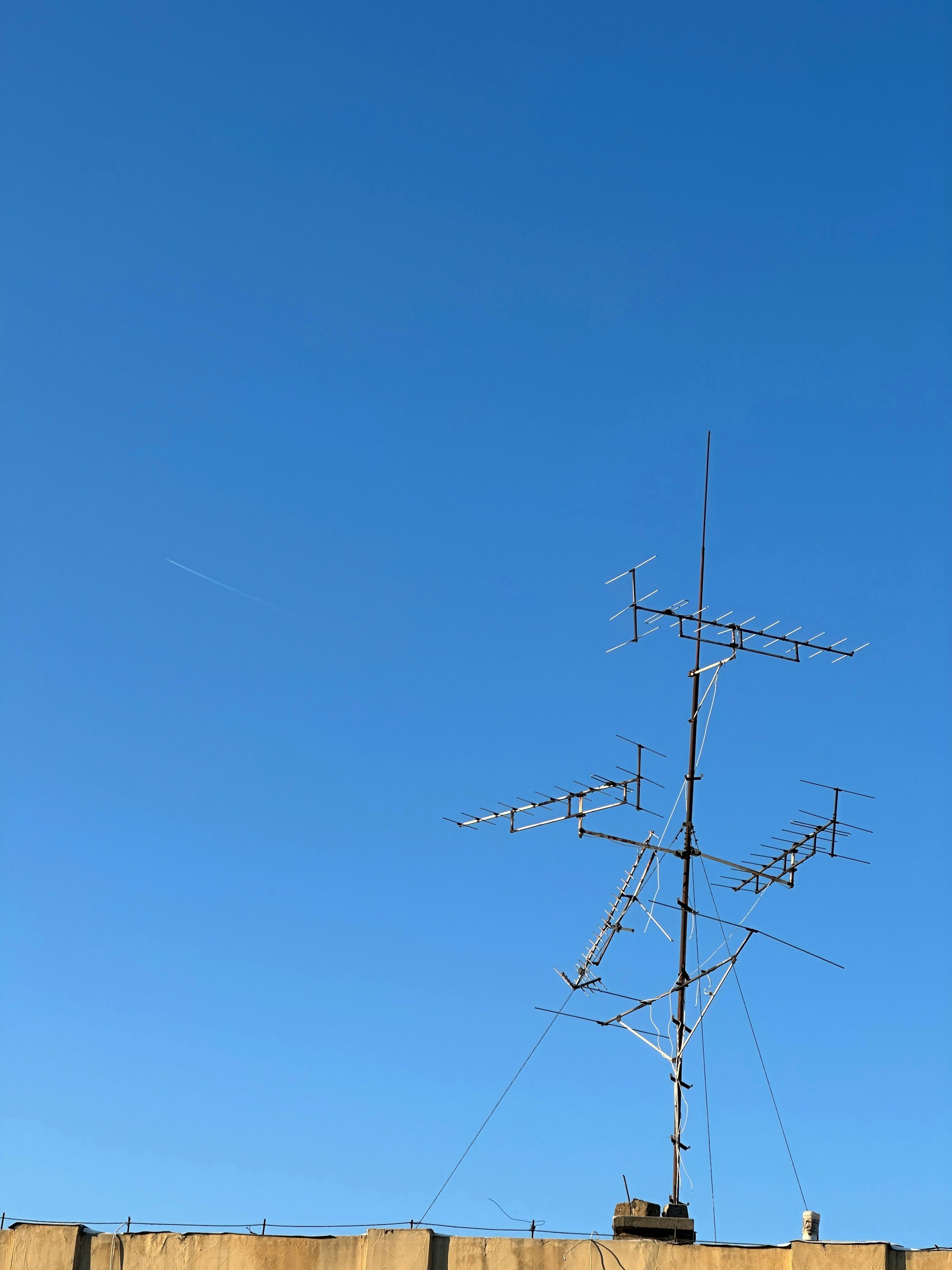 woman wearing yellow long-sleeved dress under white clouds and blue sky during daytime