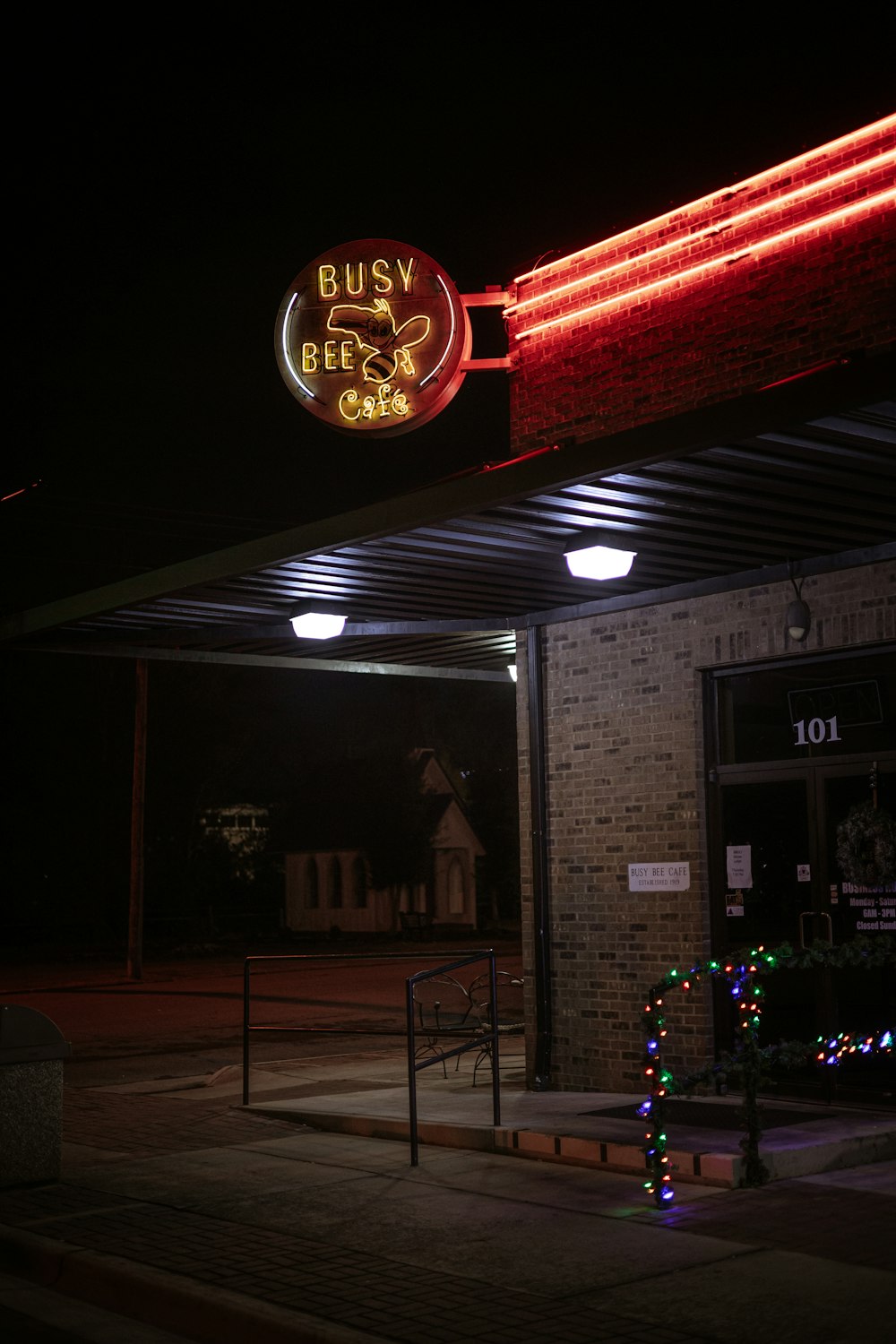 a building that has a neon sign on it