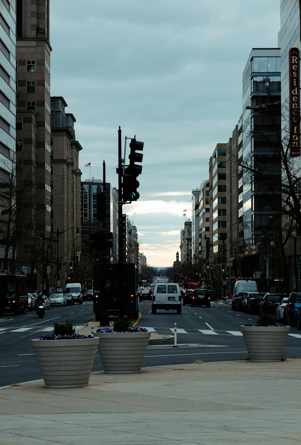 a city street filled with lots of tall buildings