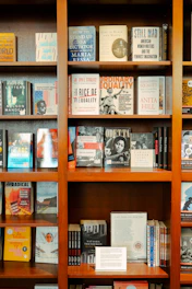 a book shelf filled with lots of books