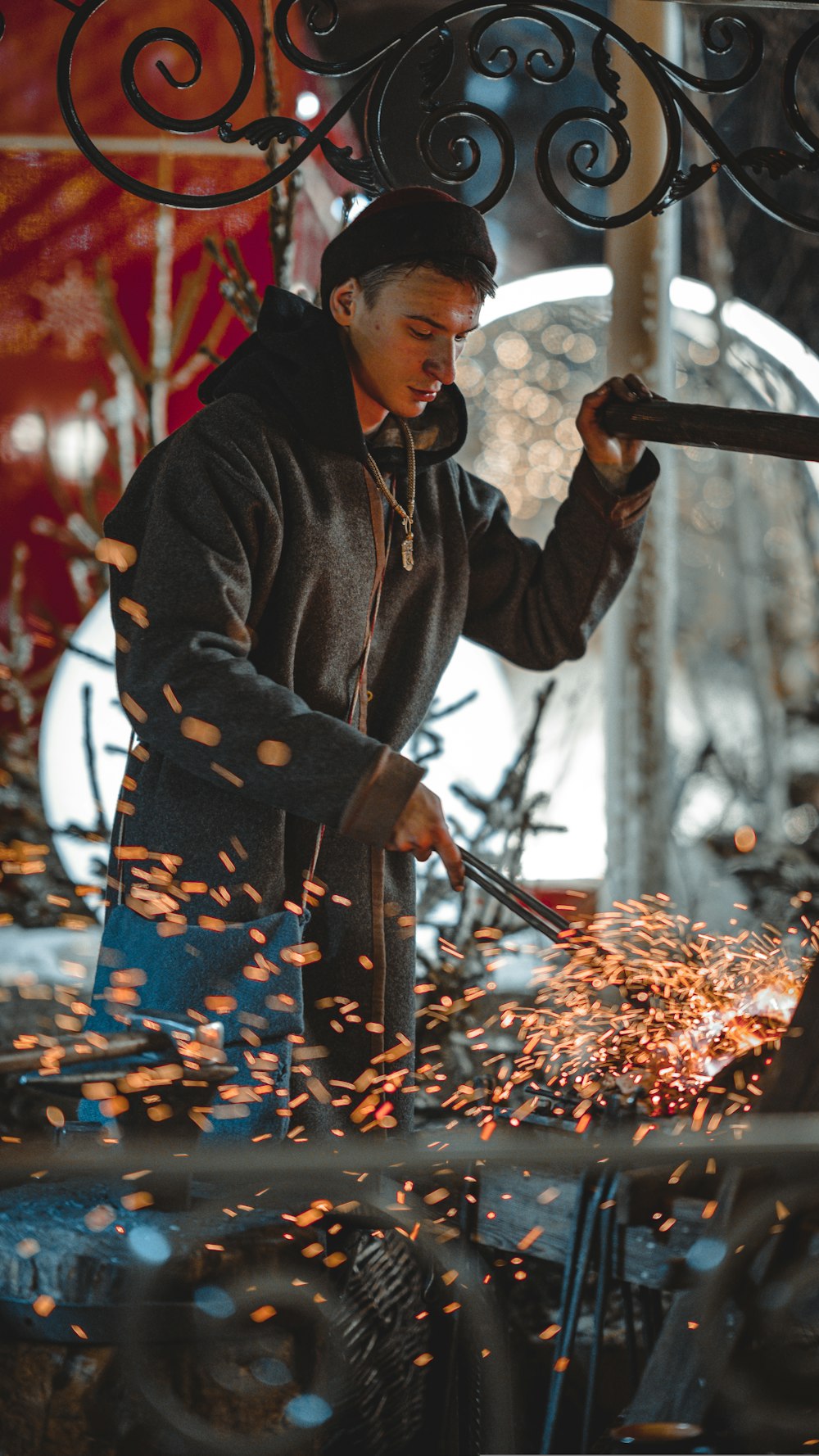 a man working on a piece of metal