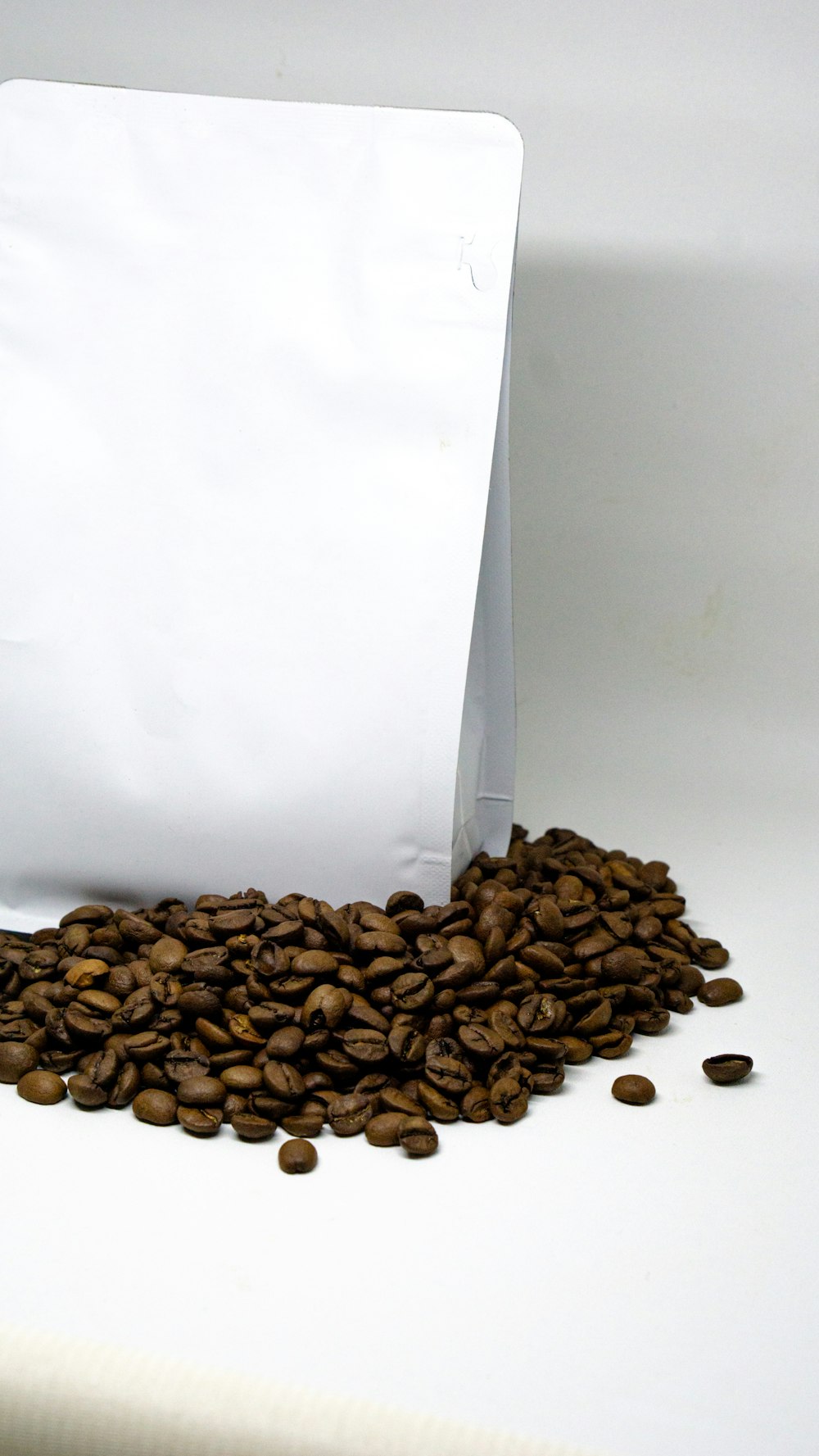 a bag of coffee beans sitting on top of a table