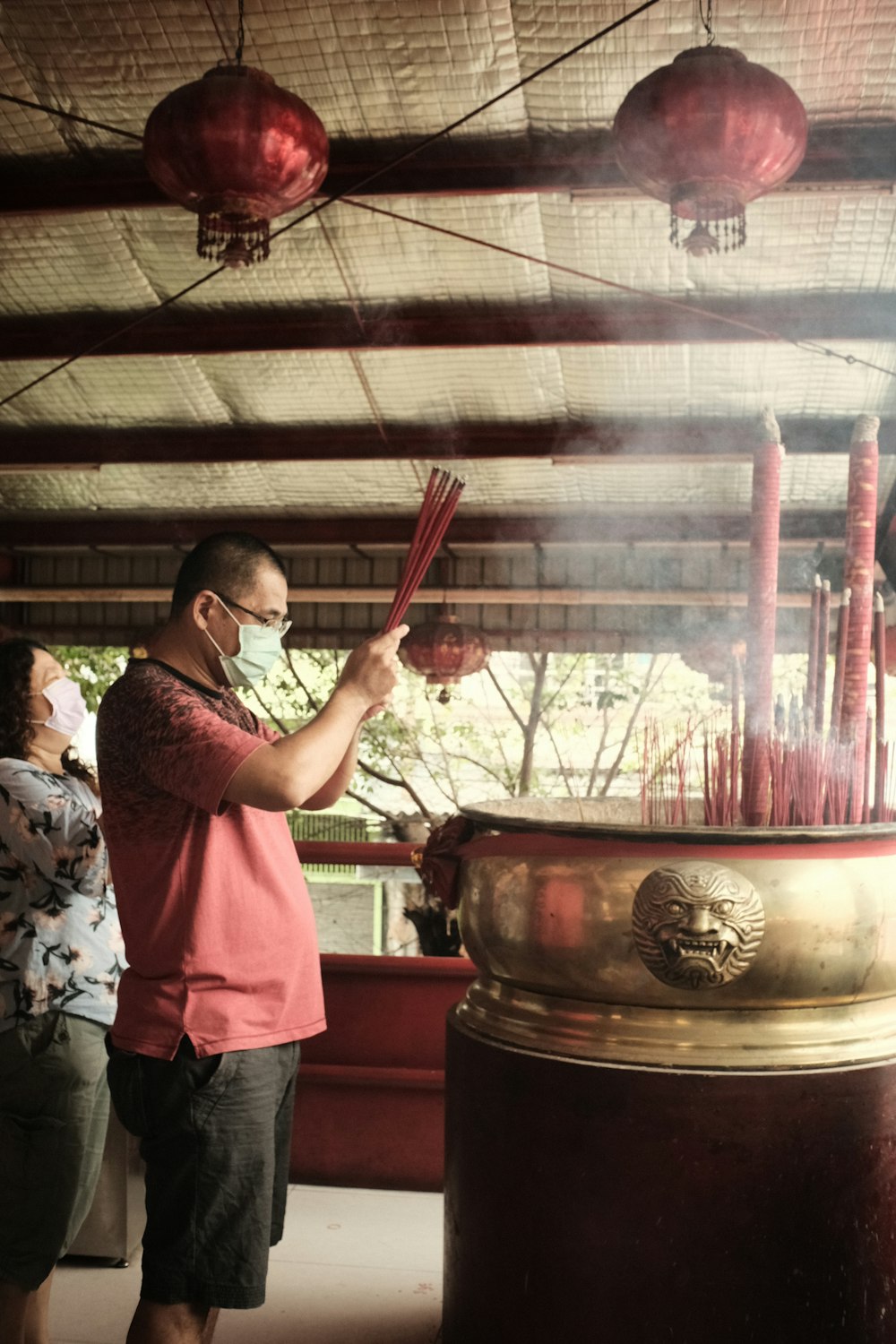 a man in a red shirt and a woman in a pink shirt