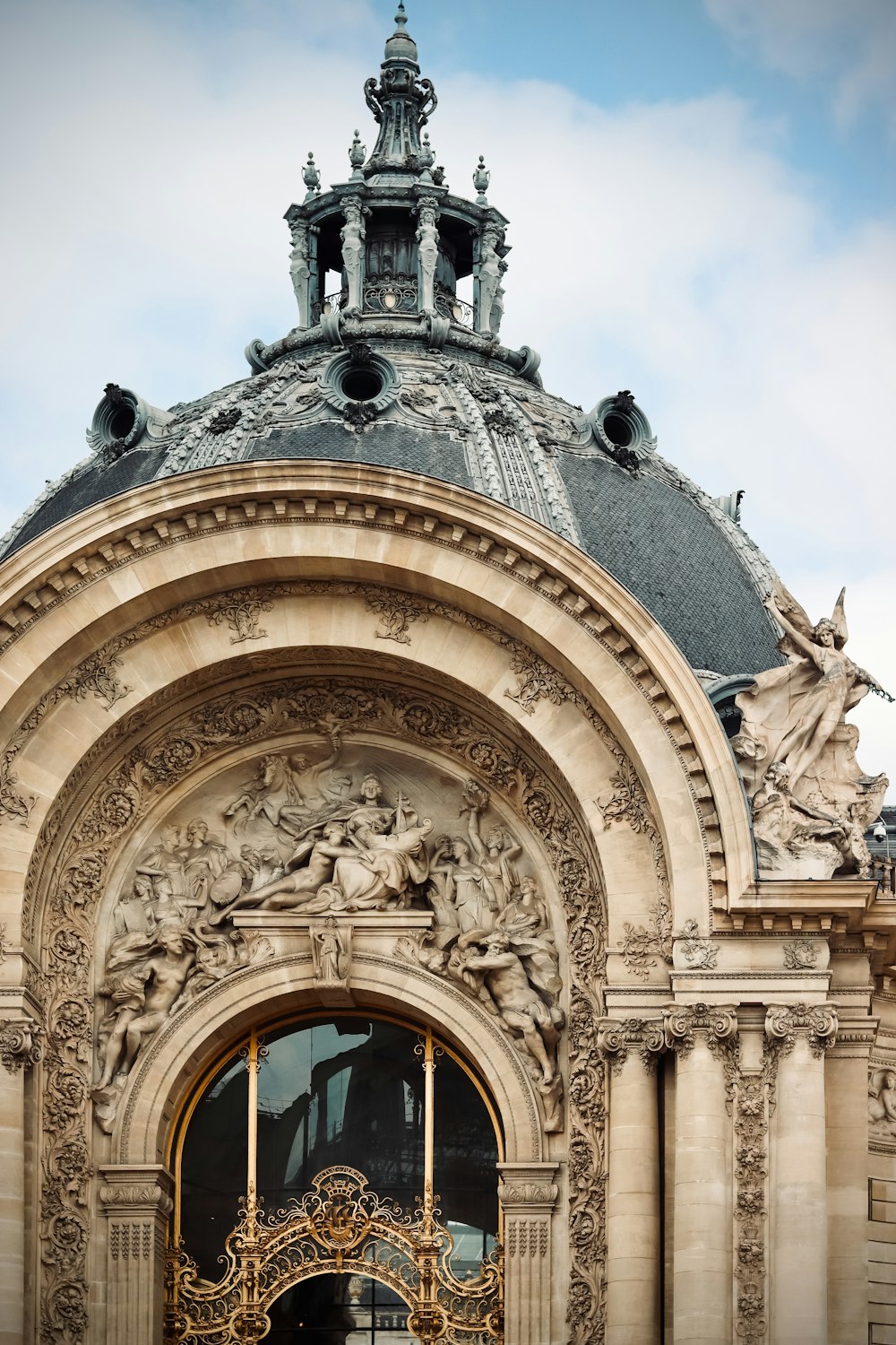 a large ornate building with a clock on top