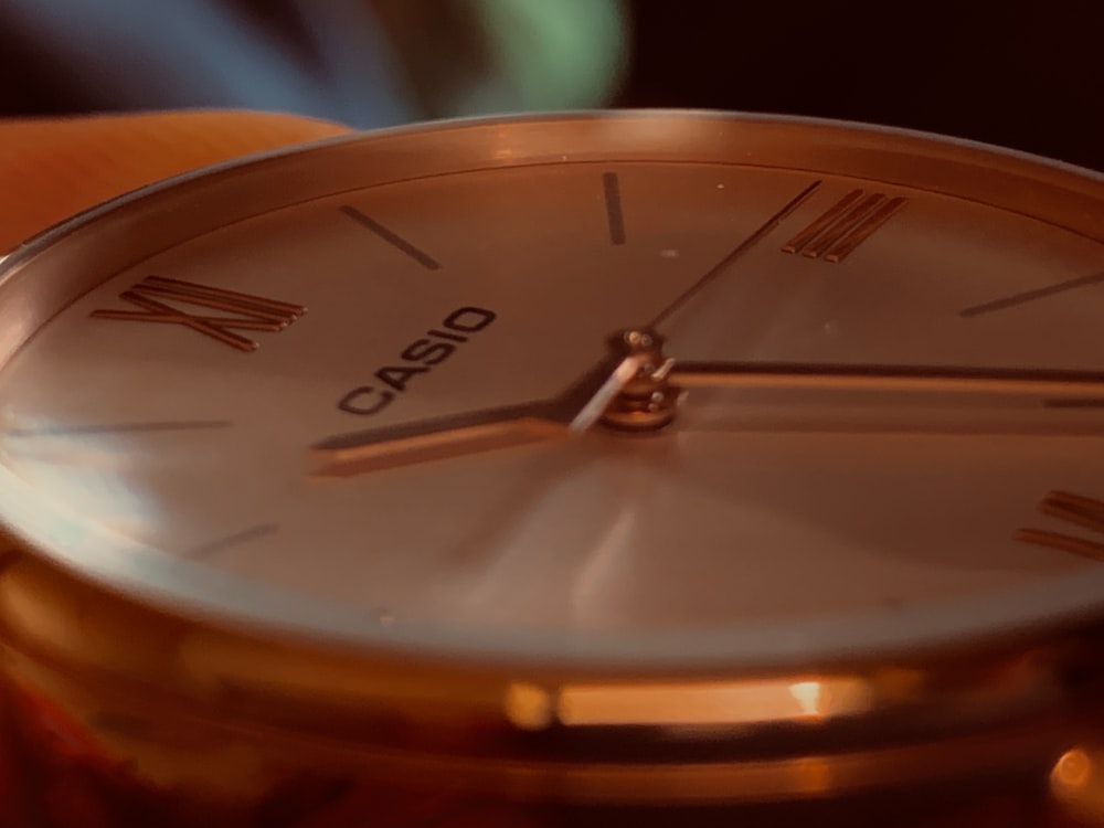 a close up of a watch on a person's wrist