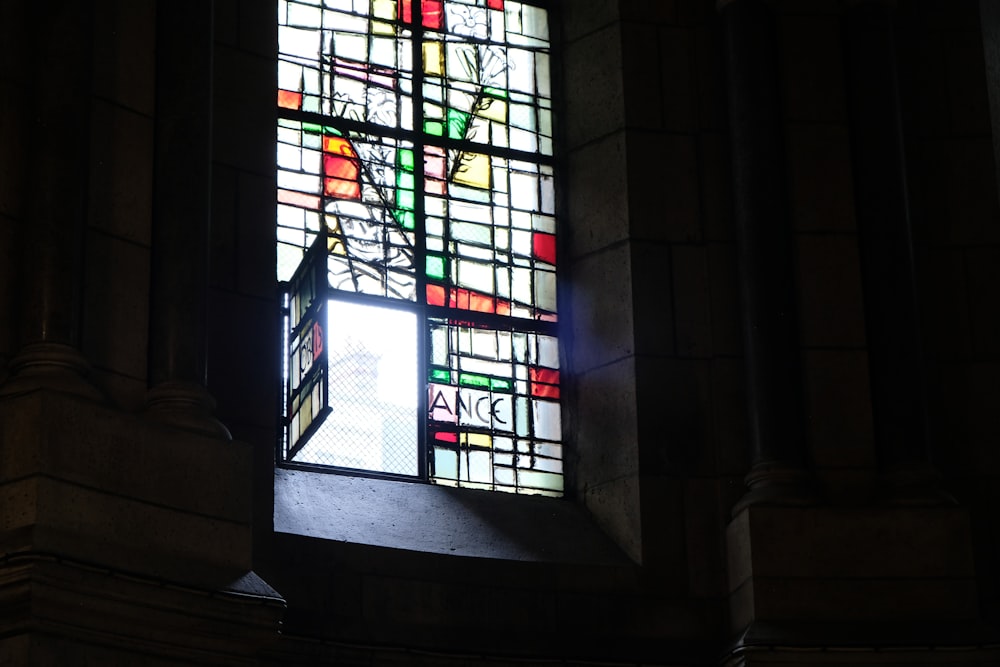 a stained glass window in a building