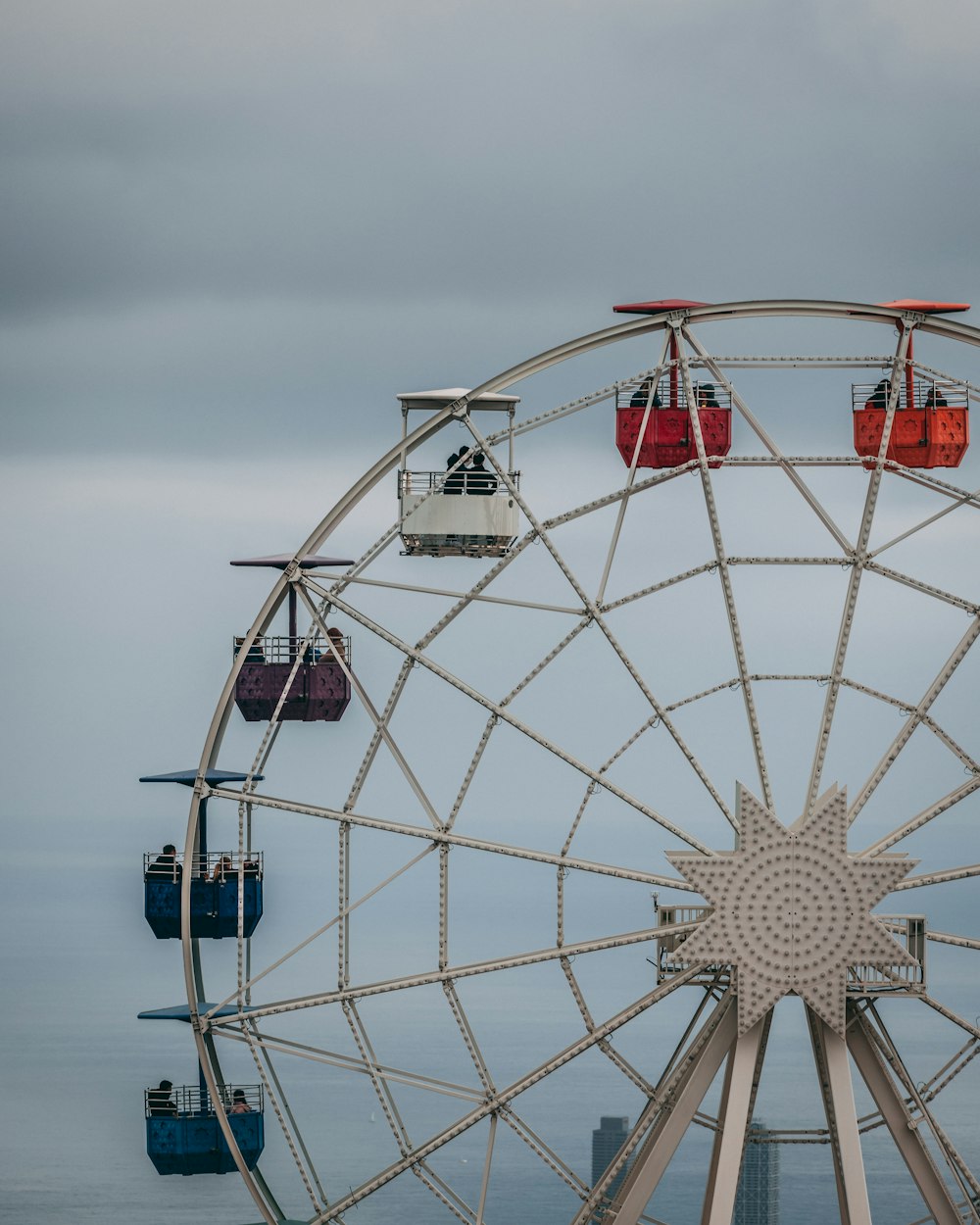 a ferris wheel in the middle of a large body of water