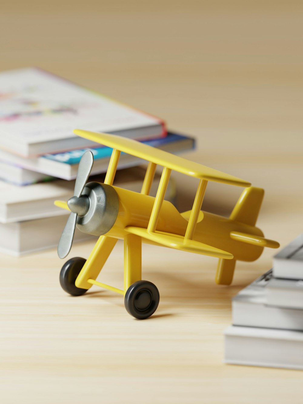 un avión de juguete sentado encima de una mesa de madera