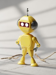 a yellow robot is standing on a tile floor