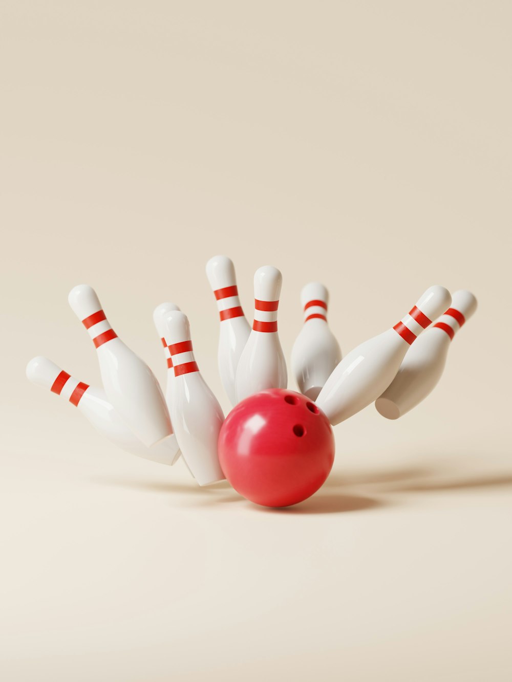 a red bowling ball crashing into the pins