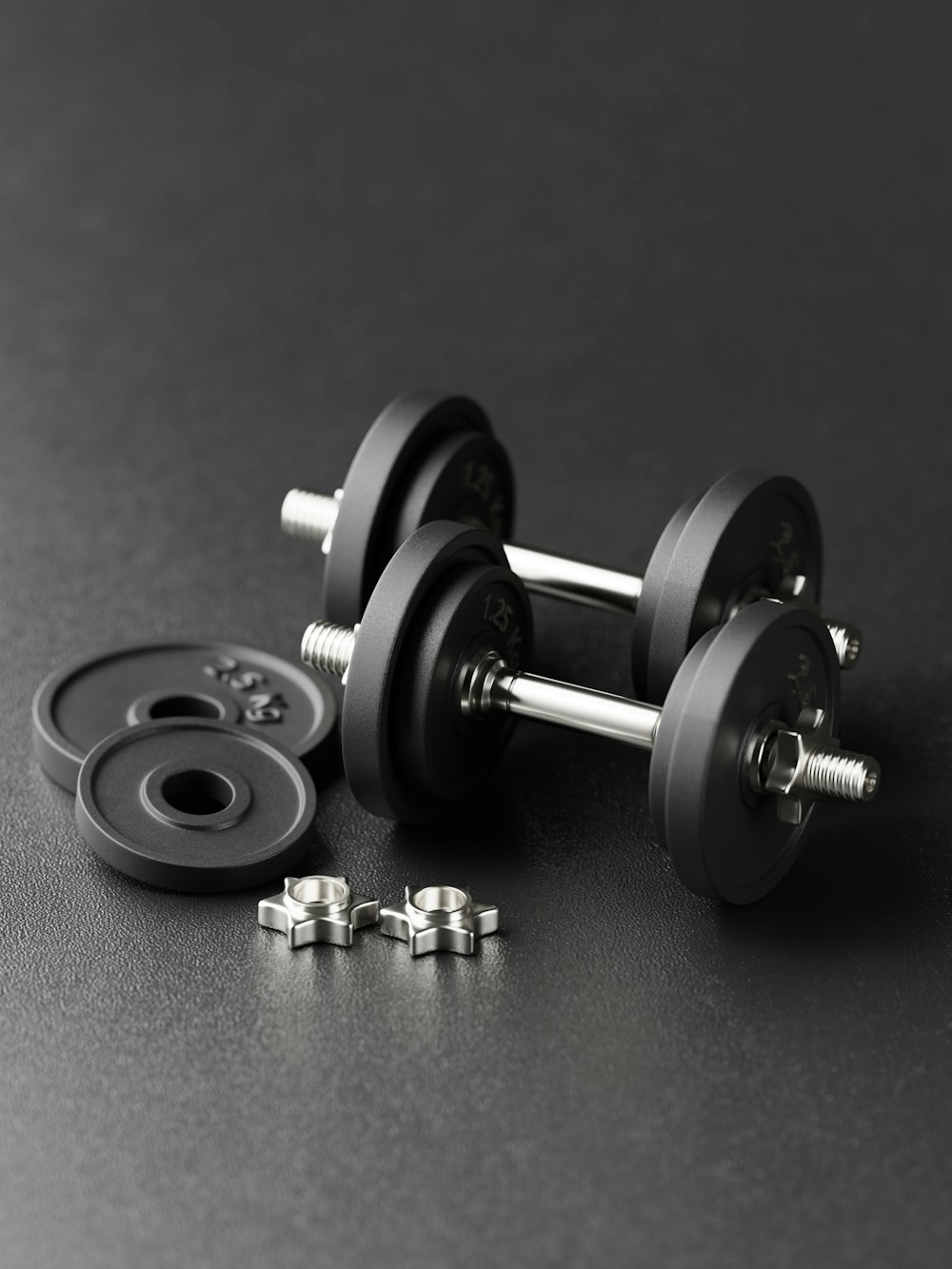 a pair of dumbbells sitting on top of a table