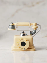 a toy phone sitting on top of a table