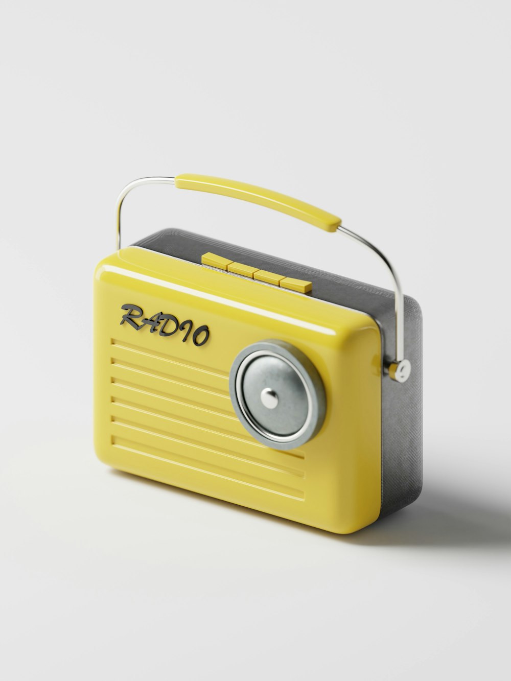 a yellow radio sitting on top of a white table