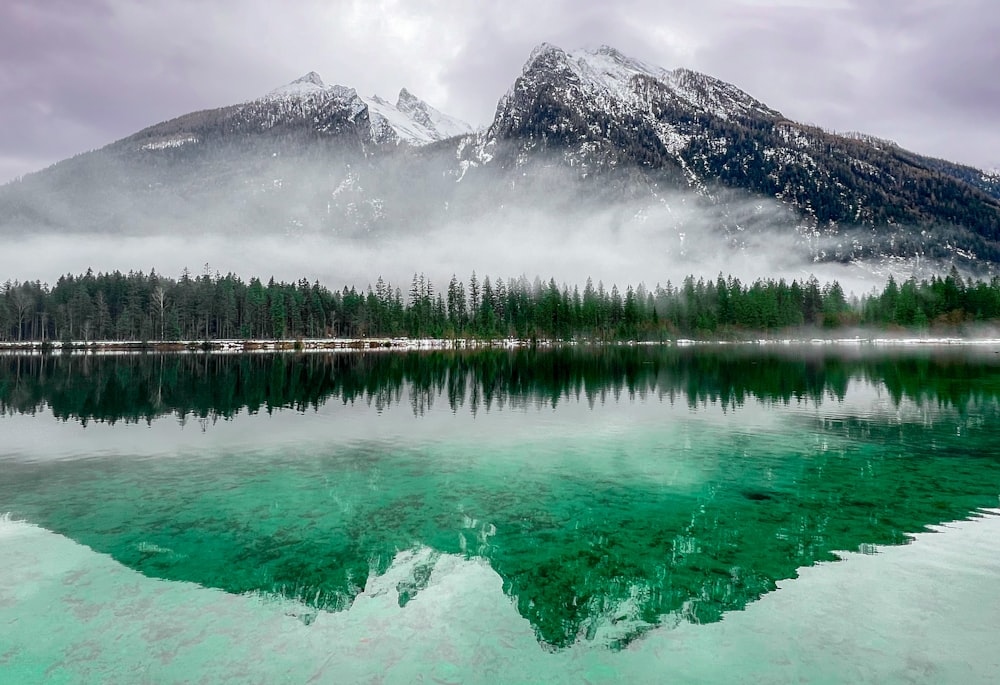 a lake with a mountain in the background