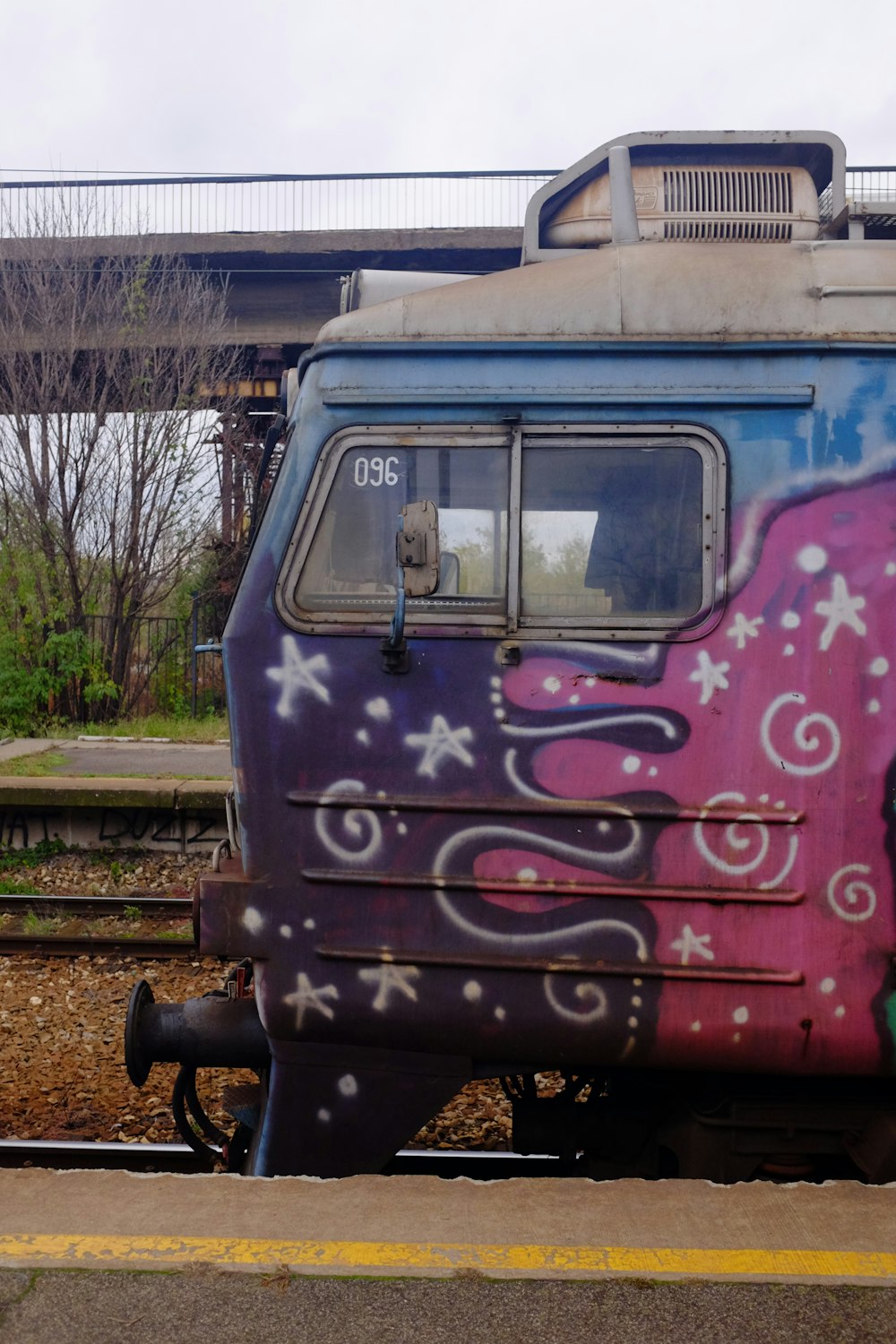 a train that has some graffiti on it