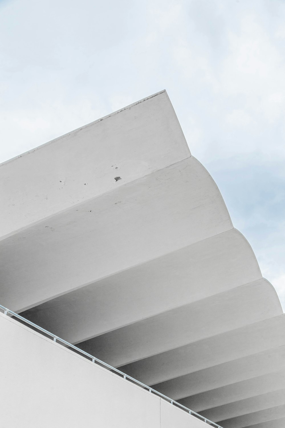 a man riding a skateboard down the side of a building