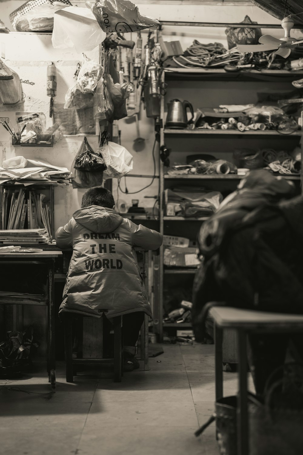 a person sitting in a chair in a room