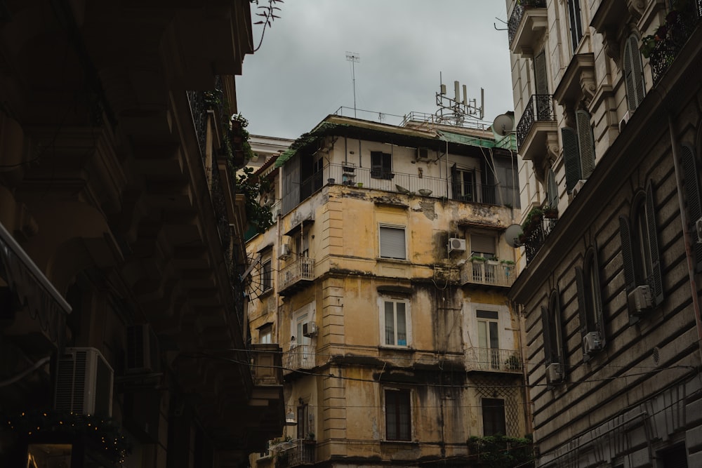 a tall building with lots of windows and balconies