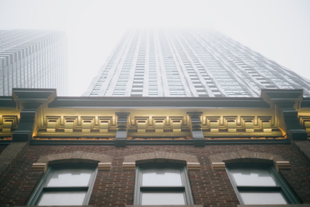 a very tall building with some windows in front of it