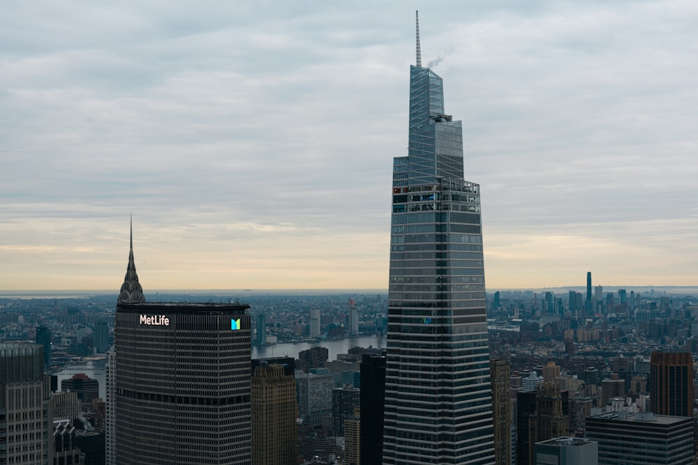 a view of a very tall building in a big city