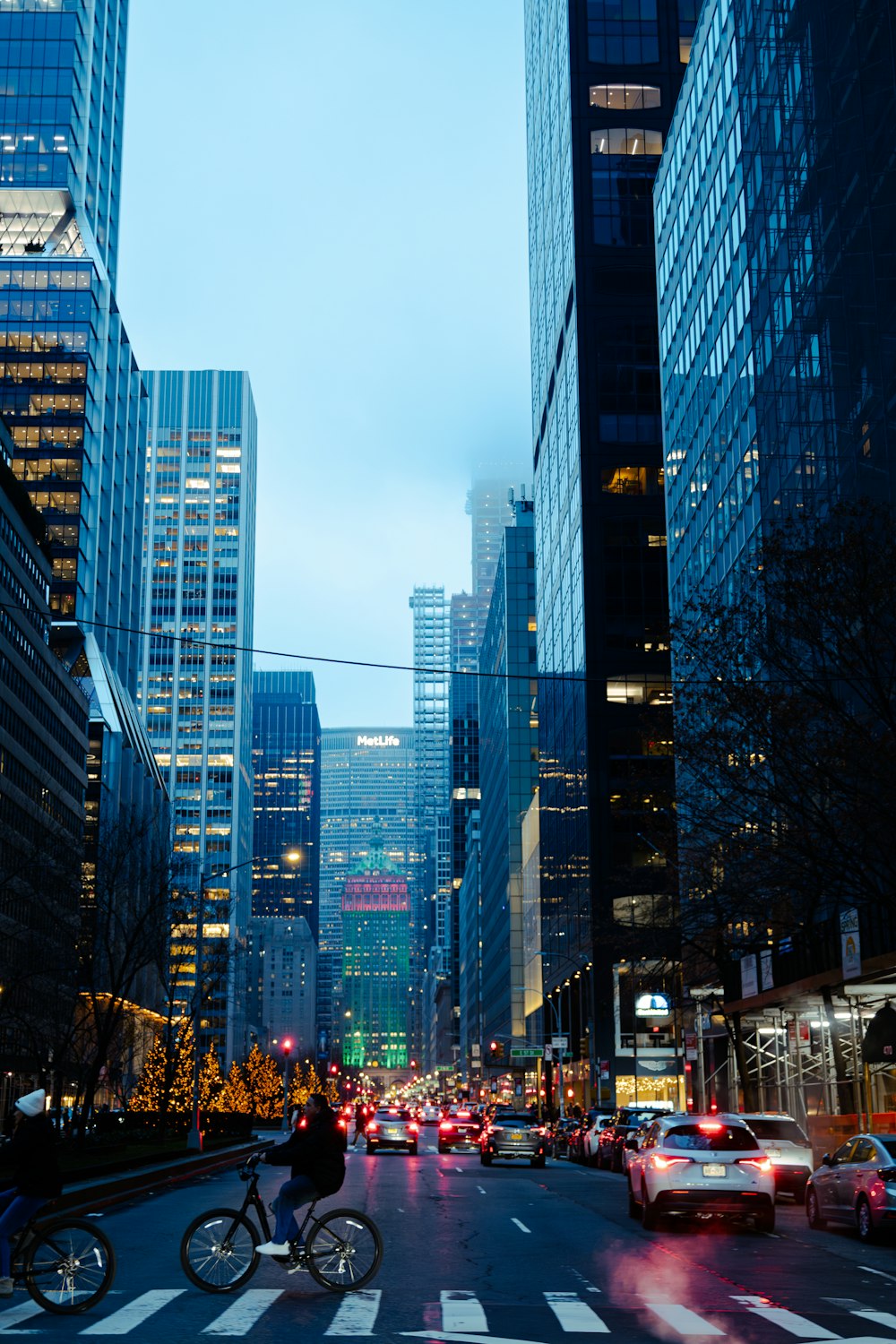 a city street filled with lots of tall buildings