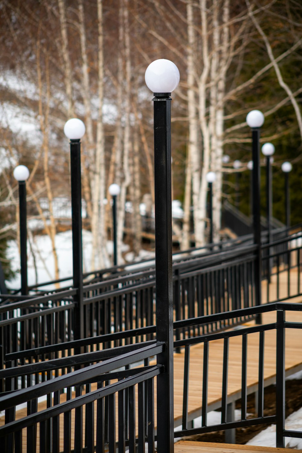 a couple of white lights sitting on top of a set of steps