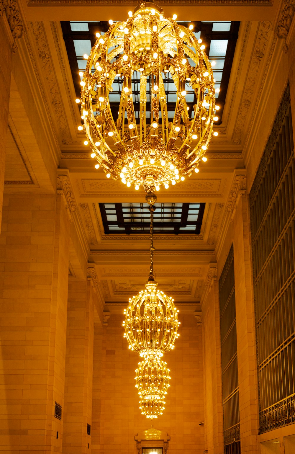 a chandelier hanging from the ceiling of a building