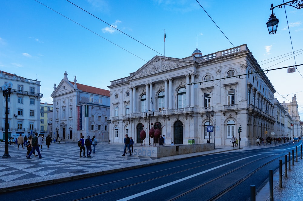 a group of people standing in front of a building