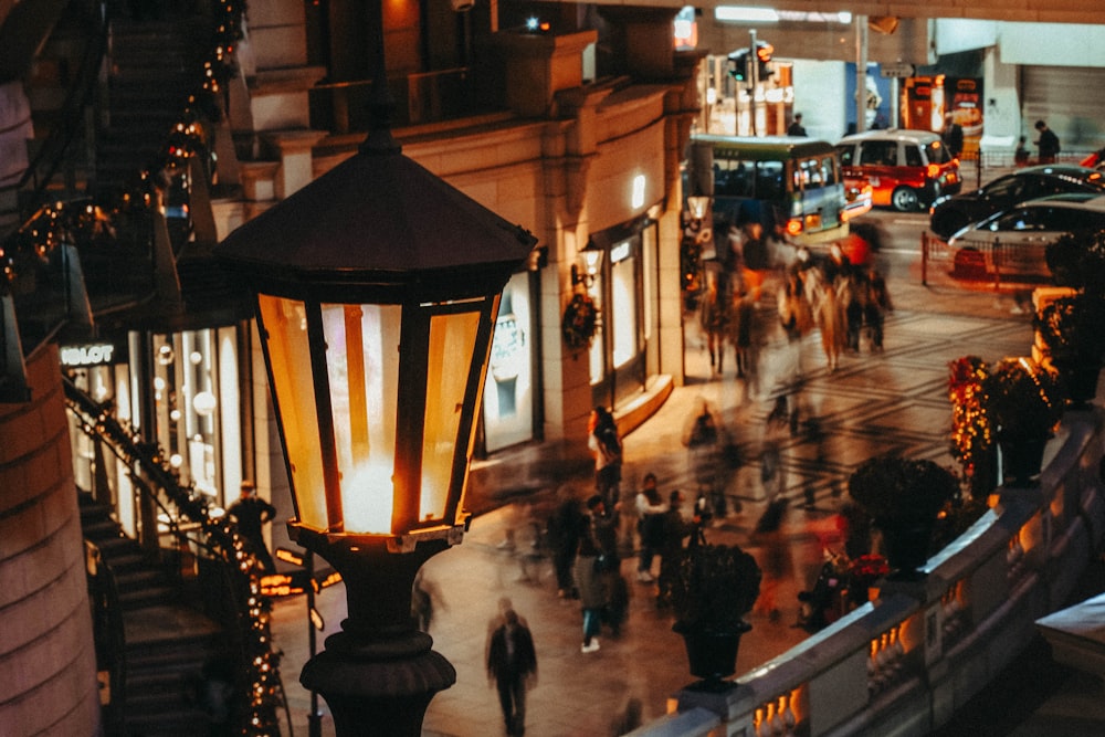 a street light in the middle of a busy street