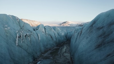 A stunning view of a glacier with vibrant blue ice.