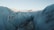 A breathtaking view of Iceland's glaciers with a traveler in the foreground.