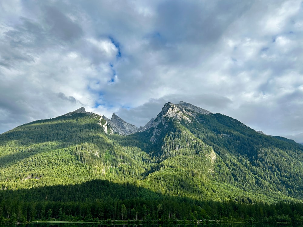 a mountain range with a lake in front of it