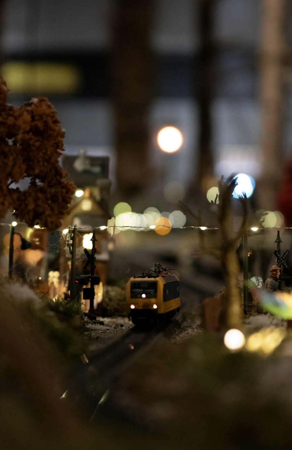 a model train set up on a track at night