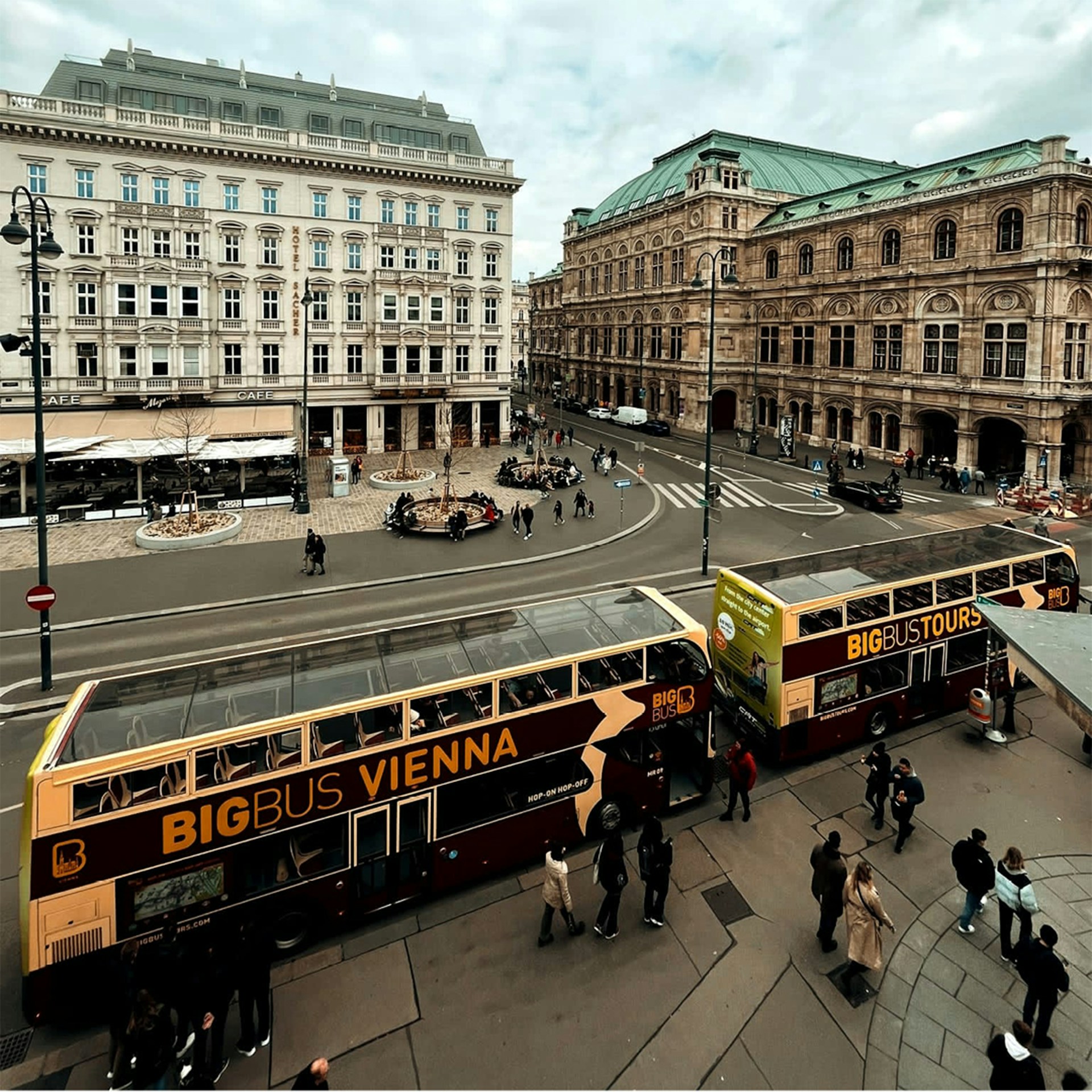 woman wearing yellow long-sleeved dress under white clouds and blue sky during daytime
