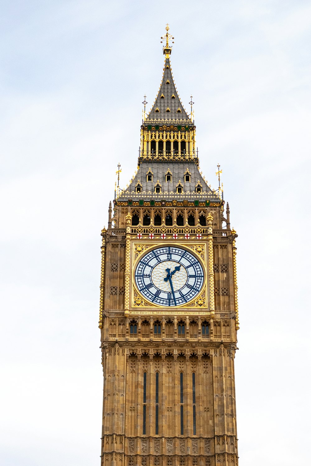 a tall clock tower with a sky background