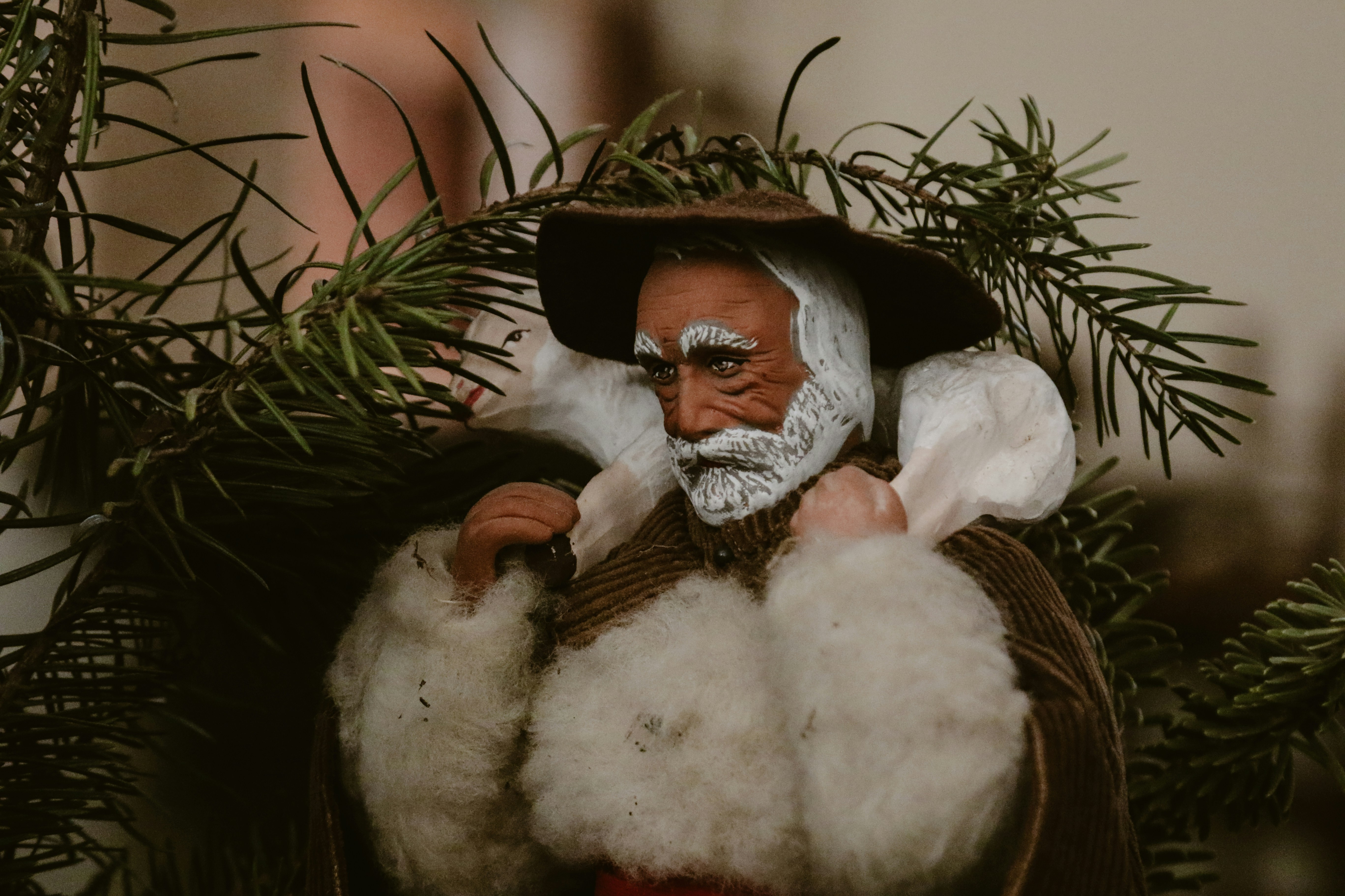 a figurine of a man with a beard and white beard