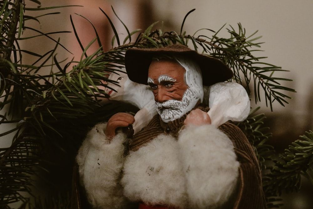 a figurine of a man with a beard and white beard