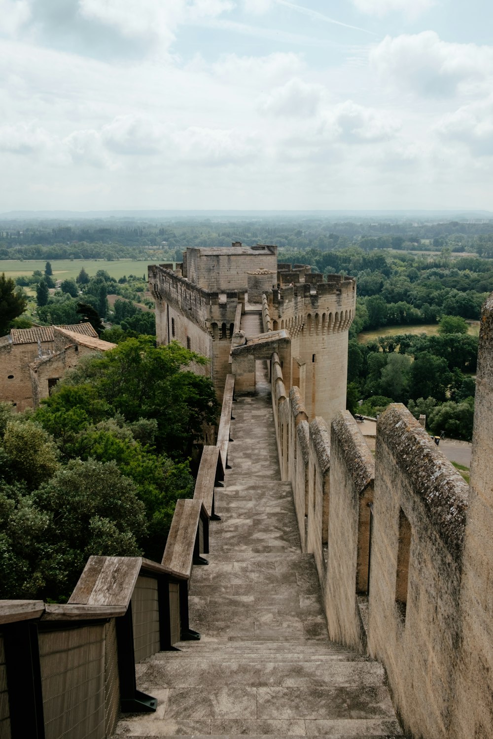 a stone staircase leading up to a castle