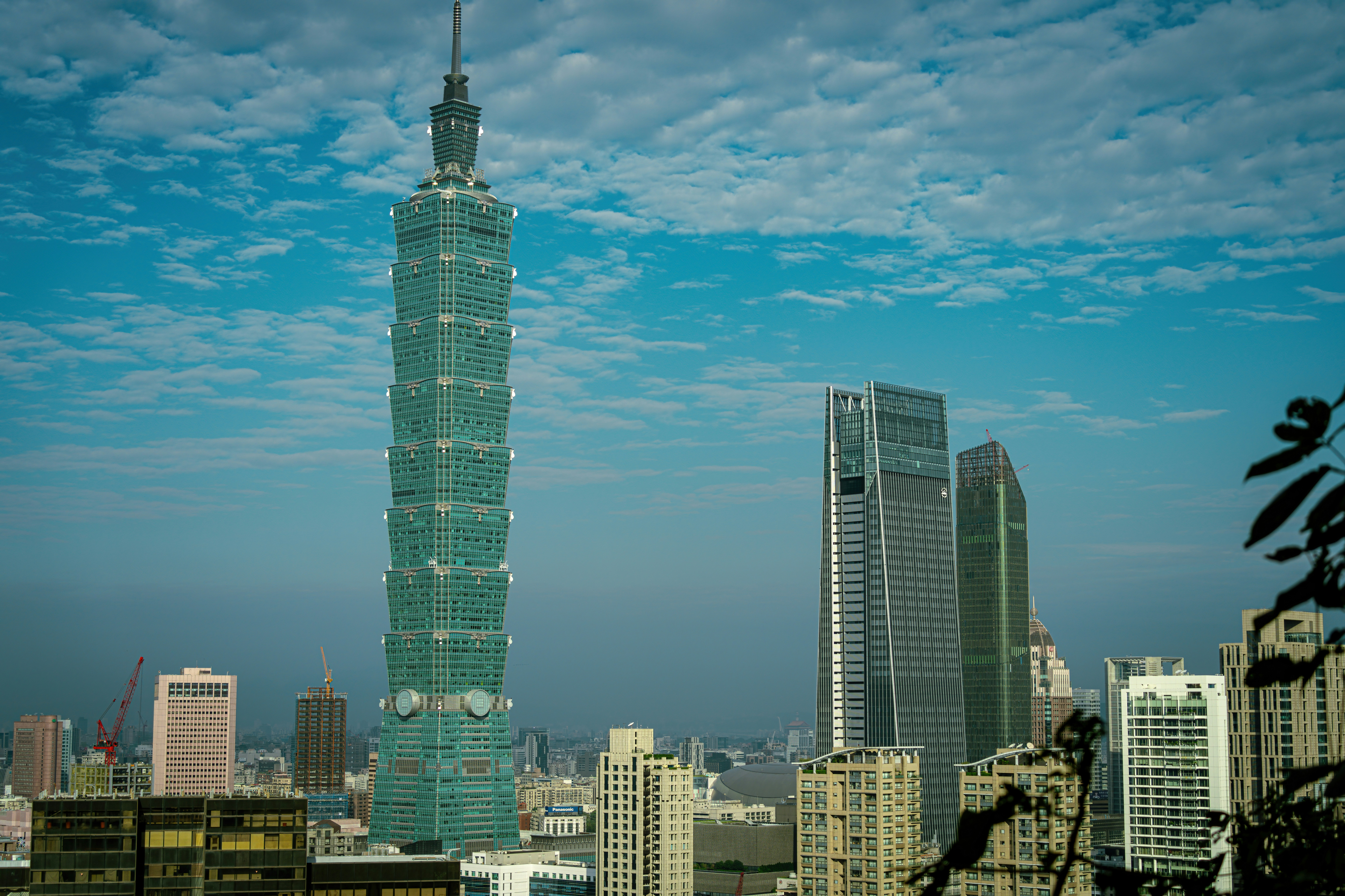 a view of a very tall building in a city