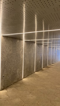 Modern commercial space featuring sleek vinyl flooring with gray tones complementing the decor.