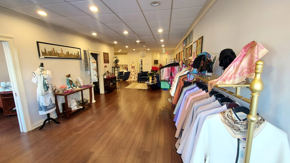 A vibrant display of trendy clothing and accessories arranged in a stylish boutique setting.