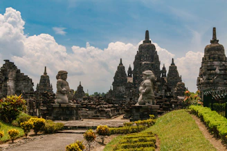 a group of statues in front of a building