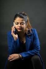 A close-up of a team member on a call, focused and attentive.