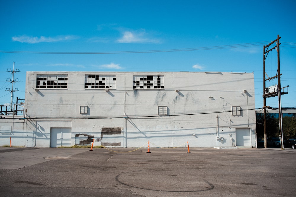 an empty parking lot in front of a building