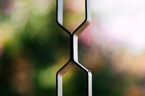 a close up of a wind chime with a blurry background